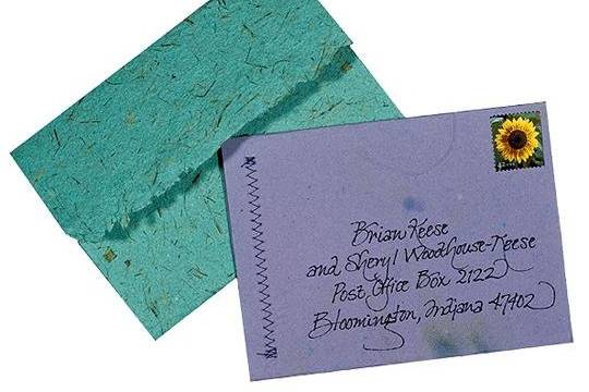 100% recycled handmade pocket wedding invitations exteriors in bluegrass and violet. Custom calligraphy services, plantable seed paper and DIY Kit available!