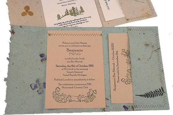 100% recycled handmade pocket wedding invitations in  natural and green spruce with recycled cardstock panels. Custom calligraphy service, plantable seed paper and DIY Kit available!