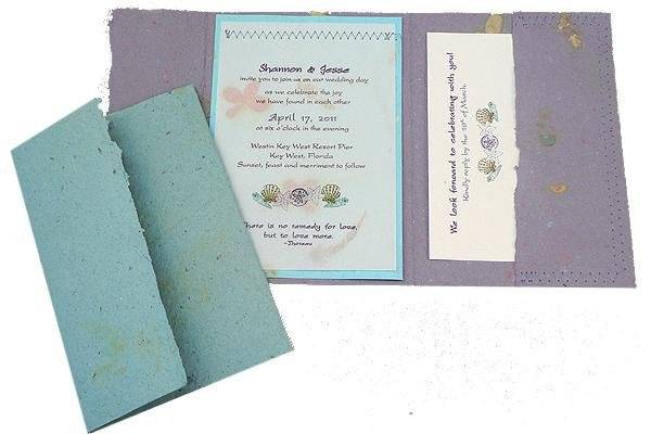 100% recycled handmade pocket wedding invitation in smoky blue and lavender with vellum panel. Custom calligraphy service, plantable seed paper and DIY Kit available!