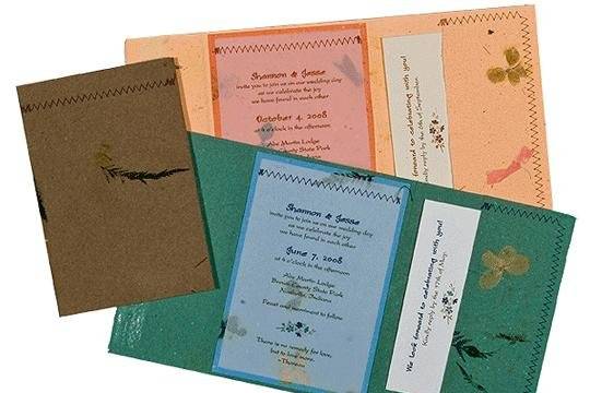 100% recycled handmade pocket invitations in mango with orange panel, mocha, and blue spruce with turquoise panel. All with recycled vellum panels. Custom calligraphy service, plantable seed paper and DIY Kit available!