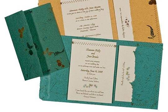 100% recycled handmade pocket wedding invitations in gold, blue spruce and bluegrass with cardstock panels. Custom calligraphy service, plantable seed paper and DIY Kit available!