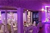 The effects of uplighting can be simply stunning! A recent wedding had a lavender color scheme. Check out the beautiful transformation the lighting created for this room!