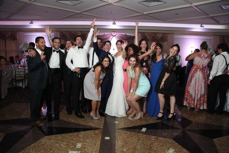 The couple with their bridesmaids and groomsmen