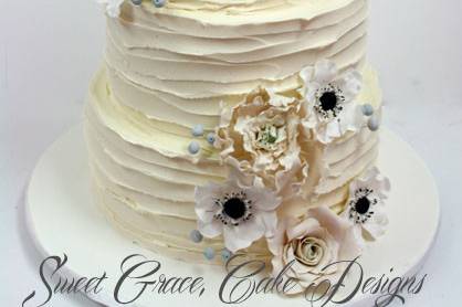 White cake and white flowers