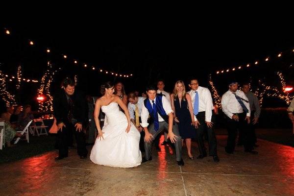 Couple dancing with the guests