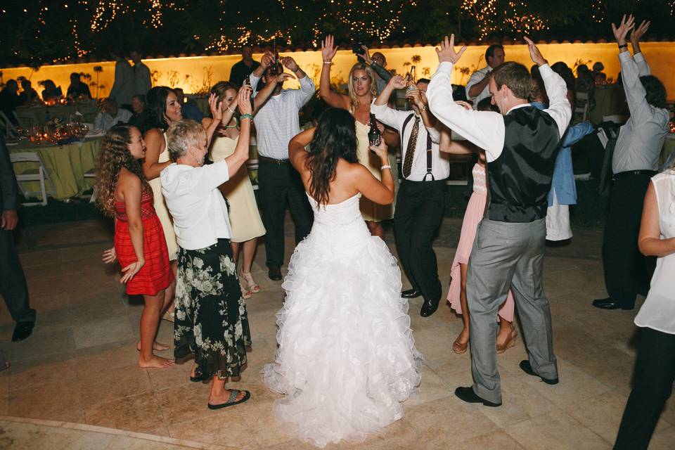 Couple dancing with the guests