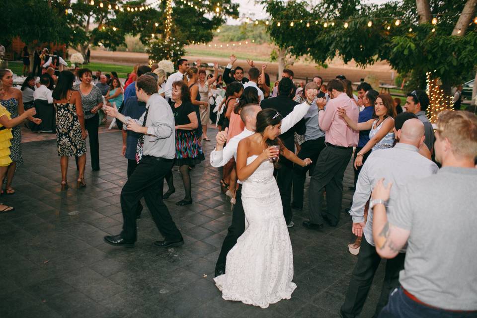 Couple dancing with the guests