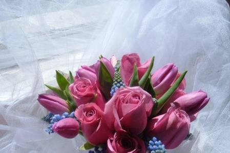 Beautiful hand tied bouquet of fresh lavender roses