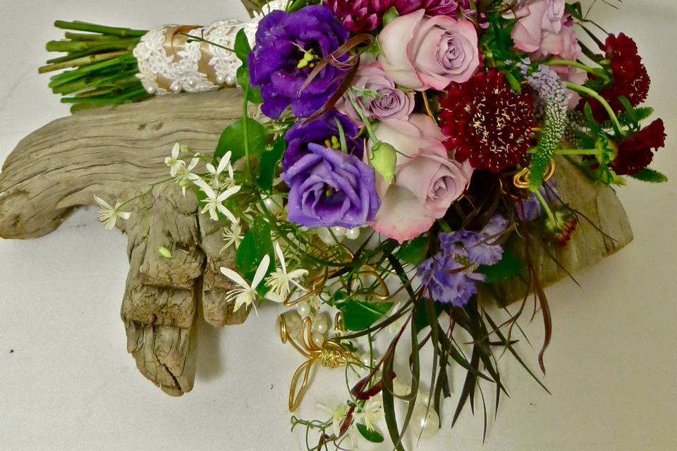 Pinks and purples and lots of unusual blooms in this bouquet