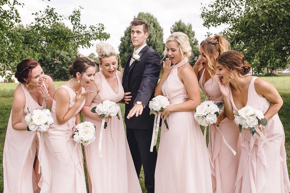 The groom with the bridesmaids