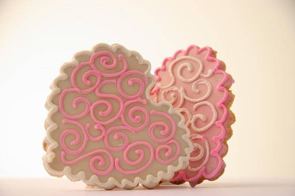 Let this romantic classic heart cookie decorated with elegant swirls be a part of your special celebration! This Sweetie Pie Classic is loved by all! Beautiful as a favor at showers, receptions or parties, let us swirl your hearts with pink, blue, yellow, or your chosen wedding colors.