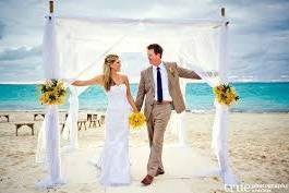 Bride and groom under the arch