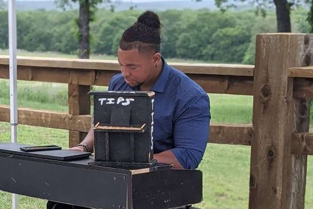 Playing piano at OG Cellers