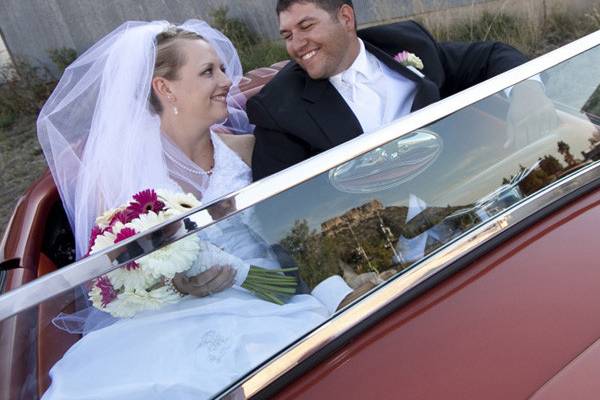 Newlyweds in their car