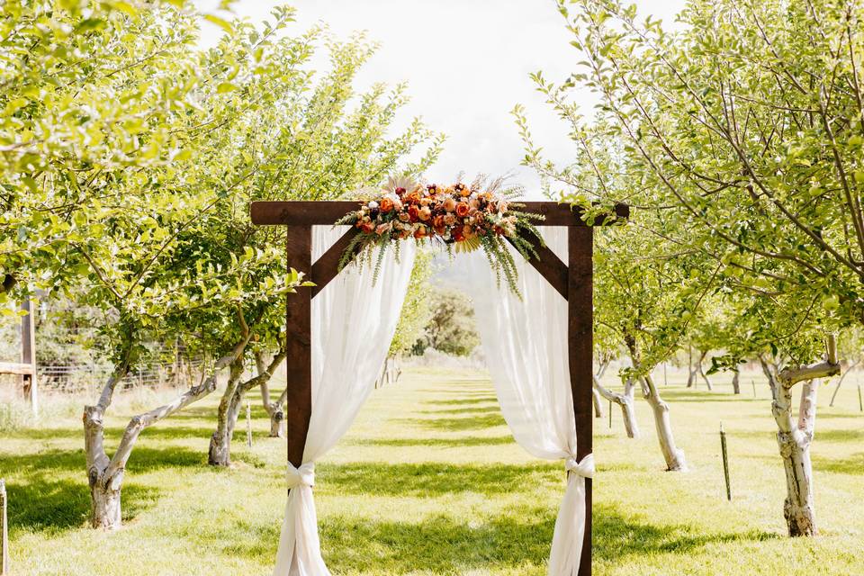 Rustic wedding flower arch