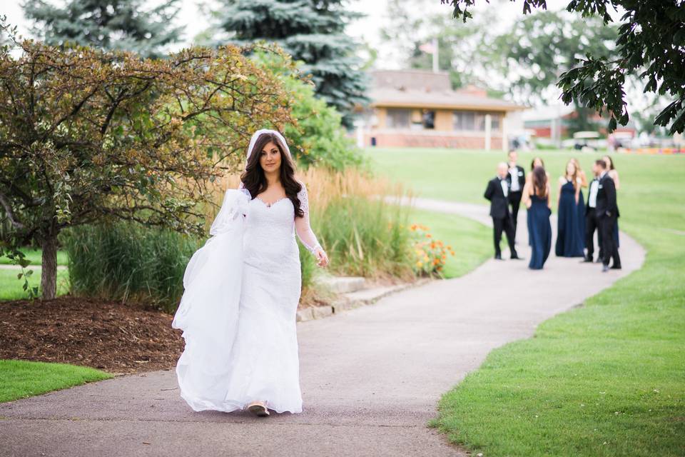 Bride walking down the path