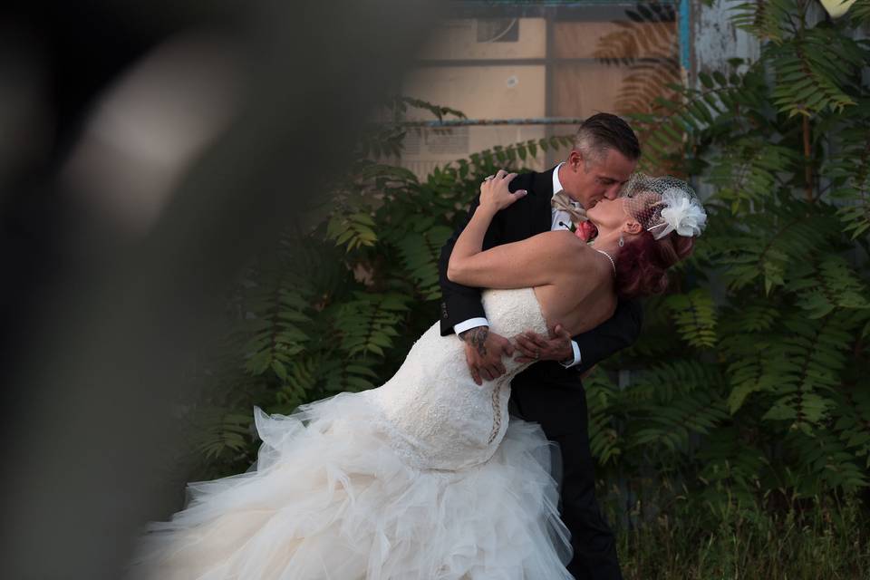 Groom kissing bride