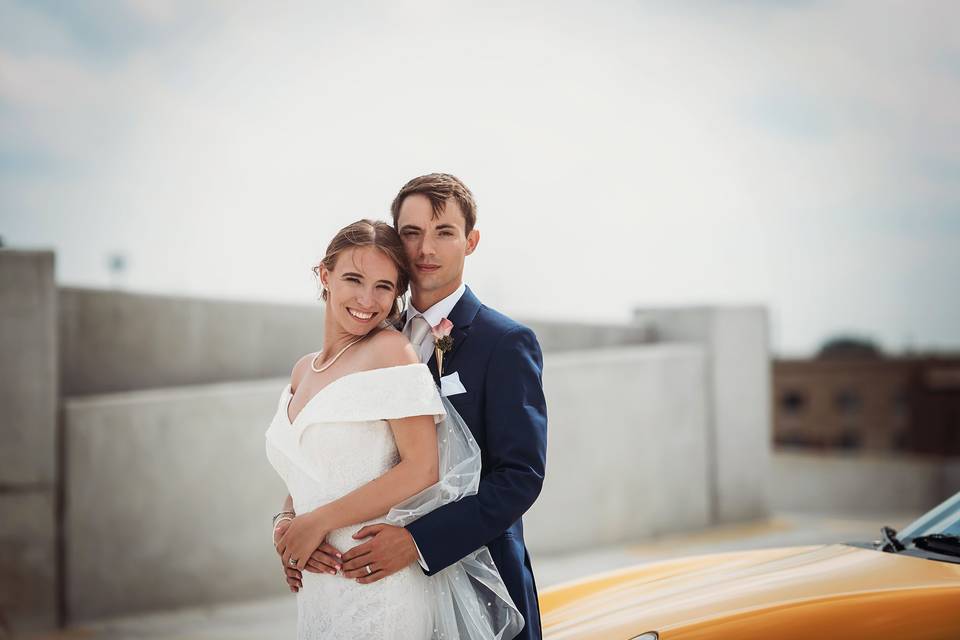 Bride and groom on rooftop