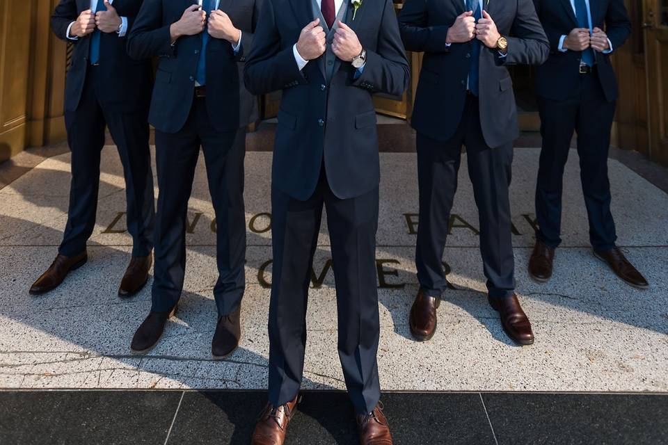 Groomsmen by gold door