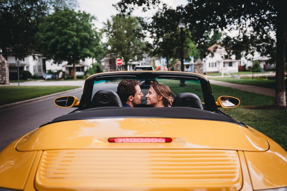 Bride and groom in Porche