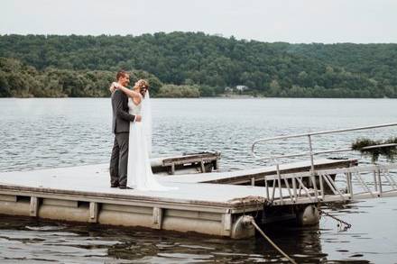 Couple embrace by the river