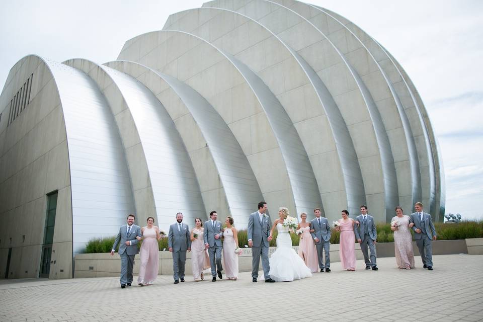 Kauffman Center for the Performing Arts Wedding Party Photos. Light pink bridesmaids dresses, gray tuxes. Downtown Kansas City wedding