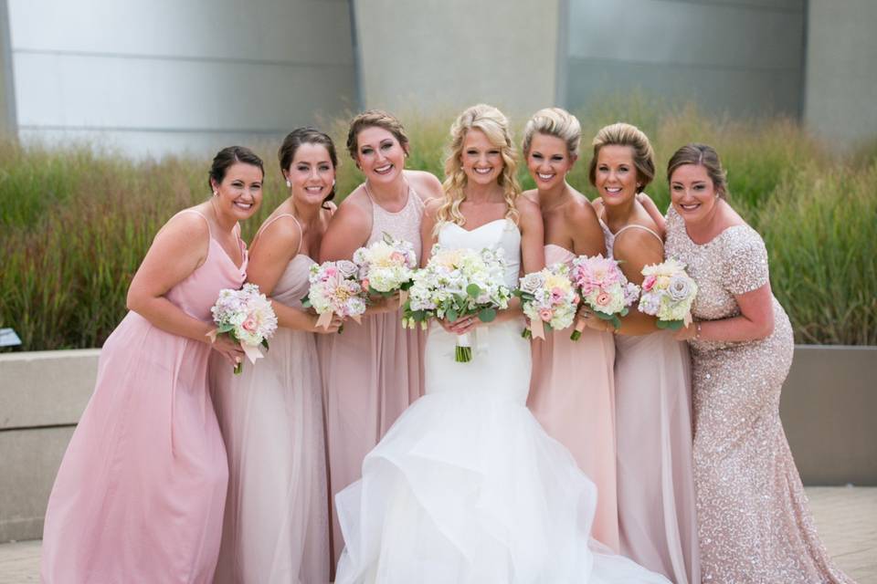 Kauffman Center for the Performing Arts Wedding Party Photos. Light pink bridesmaids dresses. Downtown Kansas City wedding. Pastel florals.