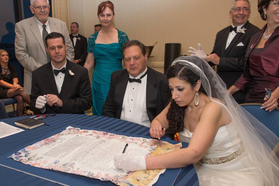 Bride signing of Ketubah