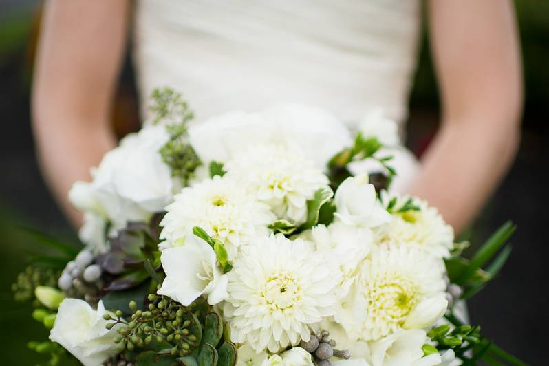 White bouquet held by the bride