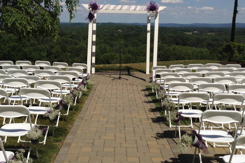 A beautiful outdoor wedding ceremony overlooking the mountains at the AlexLee House in Shelburne / Greenfield, MA.