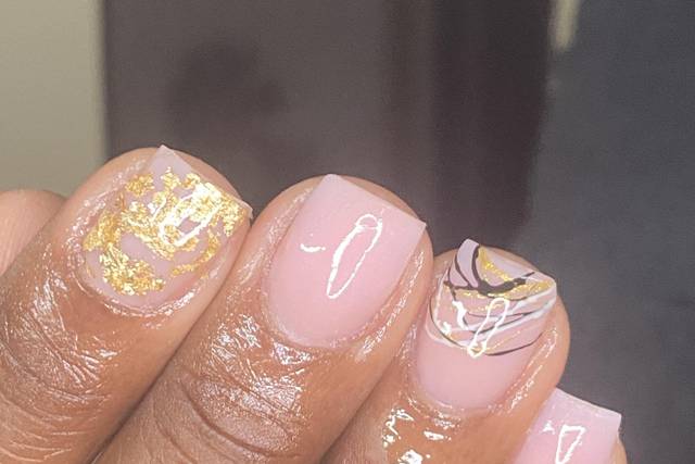 Gold and pink nail art