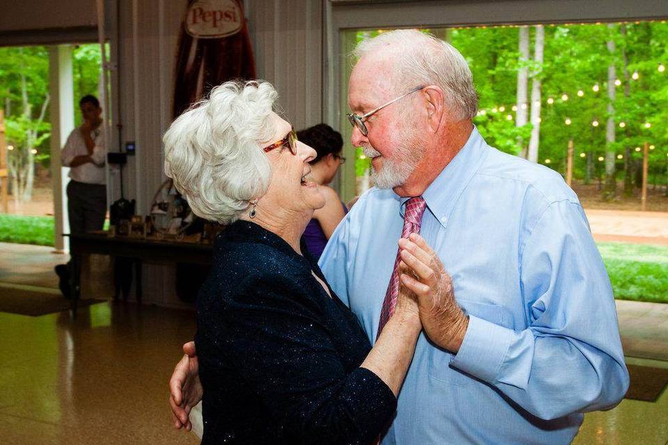 Happy couple slow dancing.