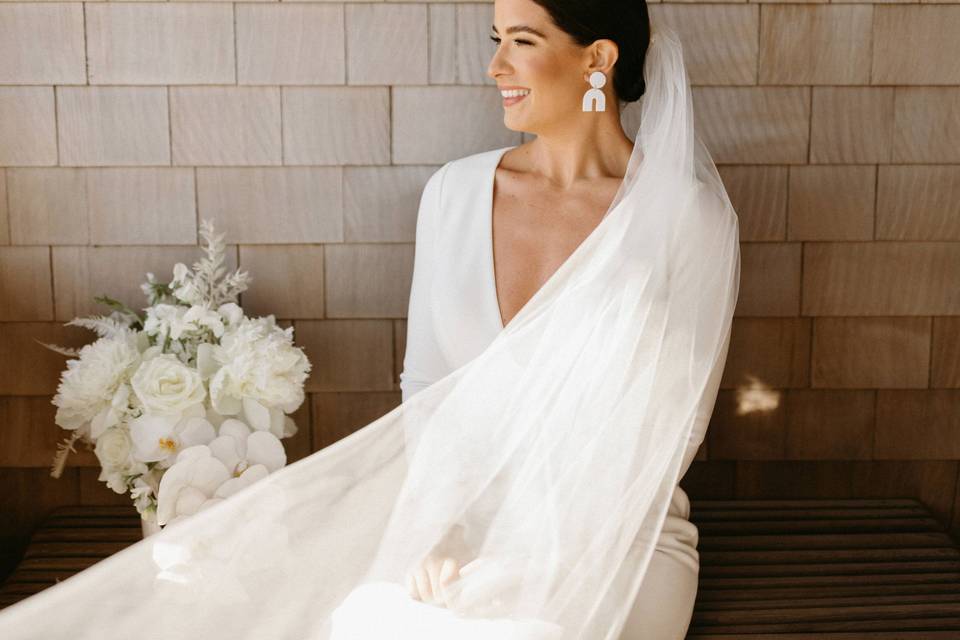 Bride in her dress looking out