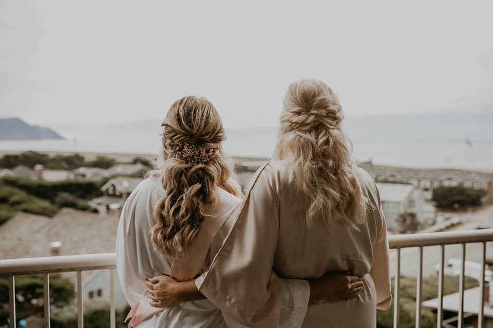 Bride and mom on balcony