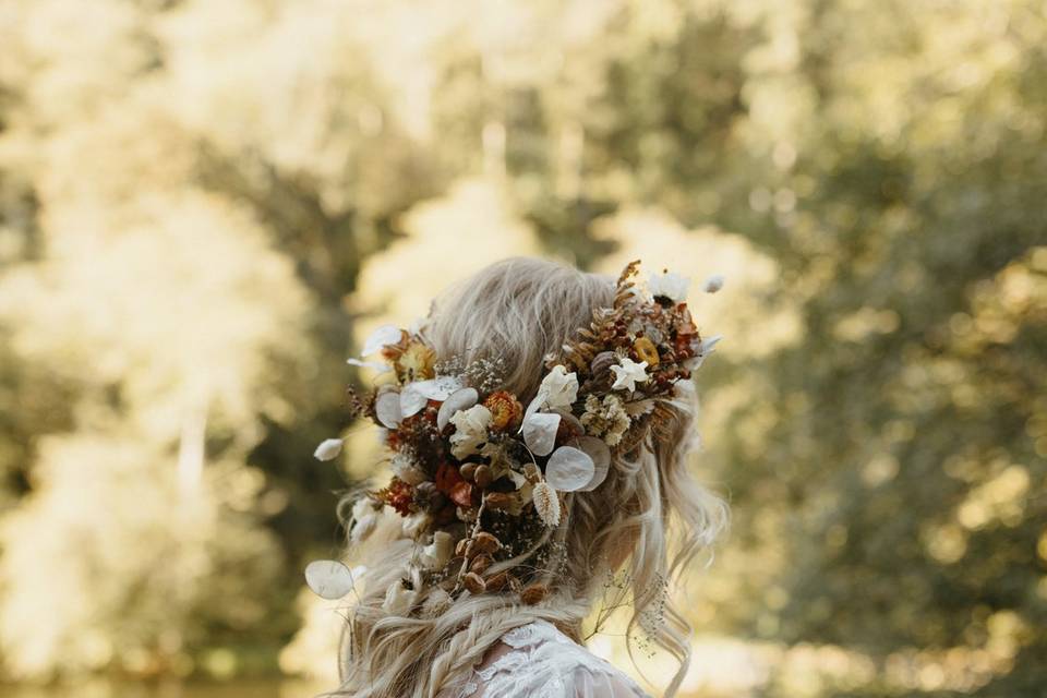 Hair curled with dried florals