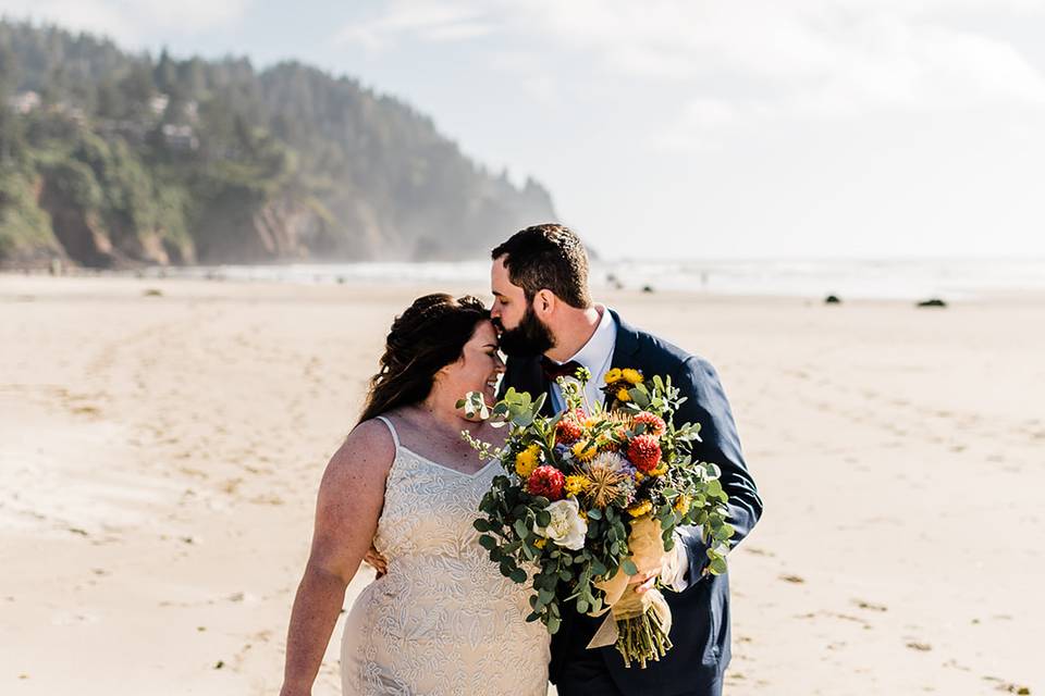 Bride and groom on beach