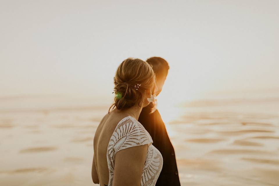 Bride and groom looking out