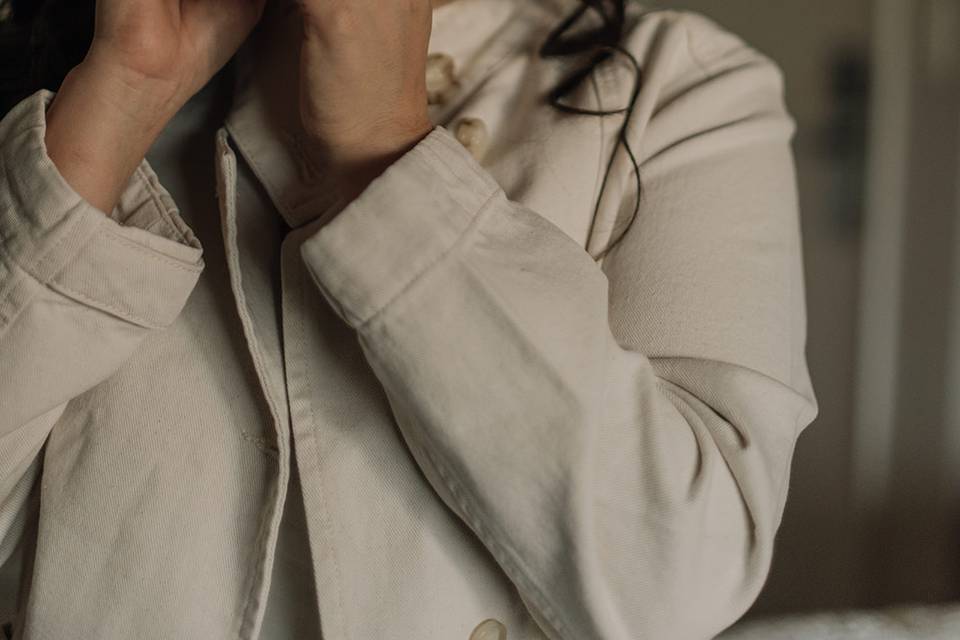 Bride putting in earring