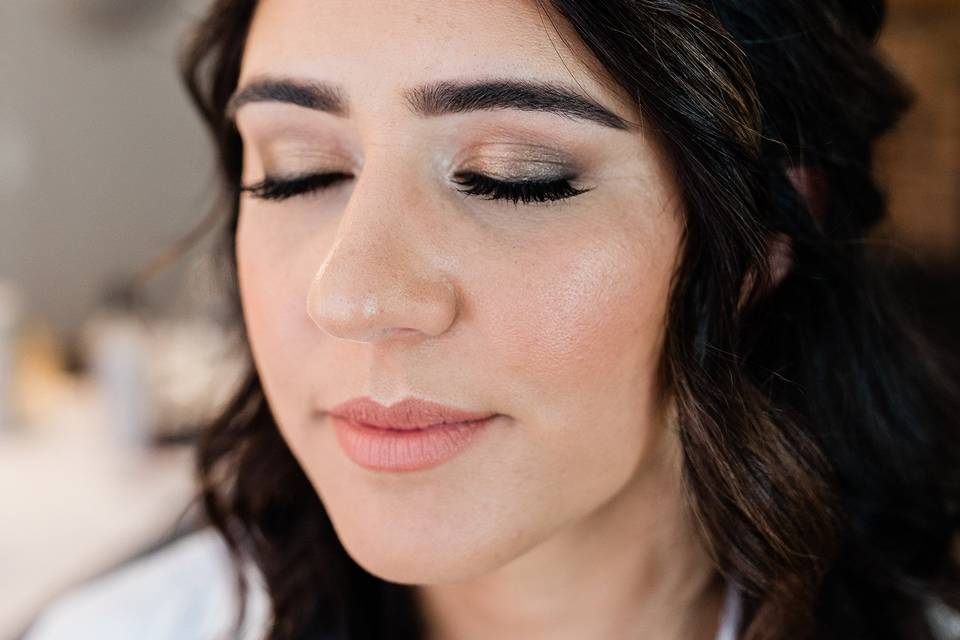 Bride smiling with eyes closed