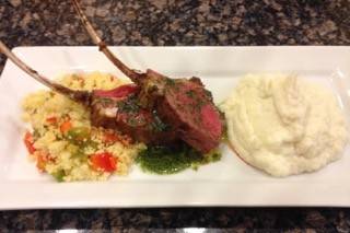 Lamb with veggie couscous, cauliflower mashed finished with a mint sauce