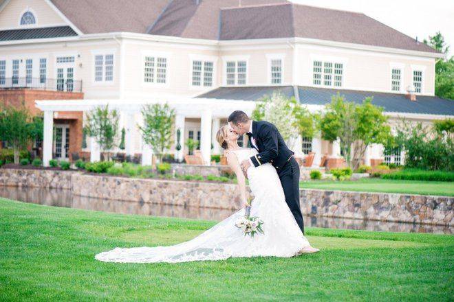 Groom kissing his bride