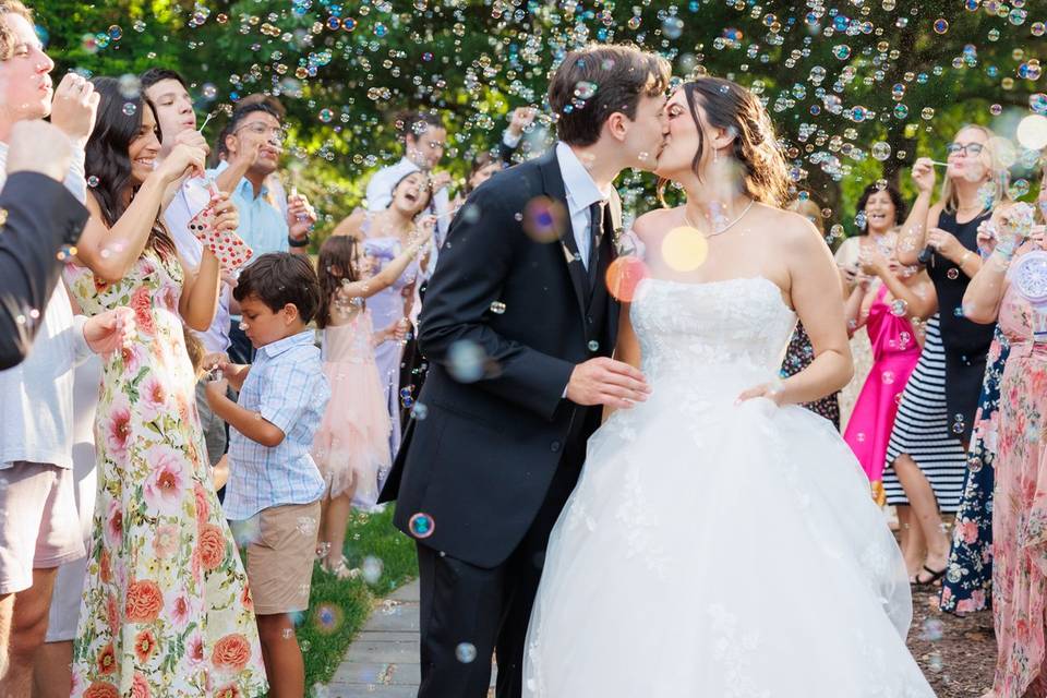 Bride and groom with bubbles