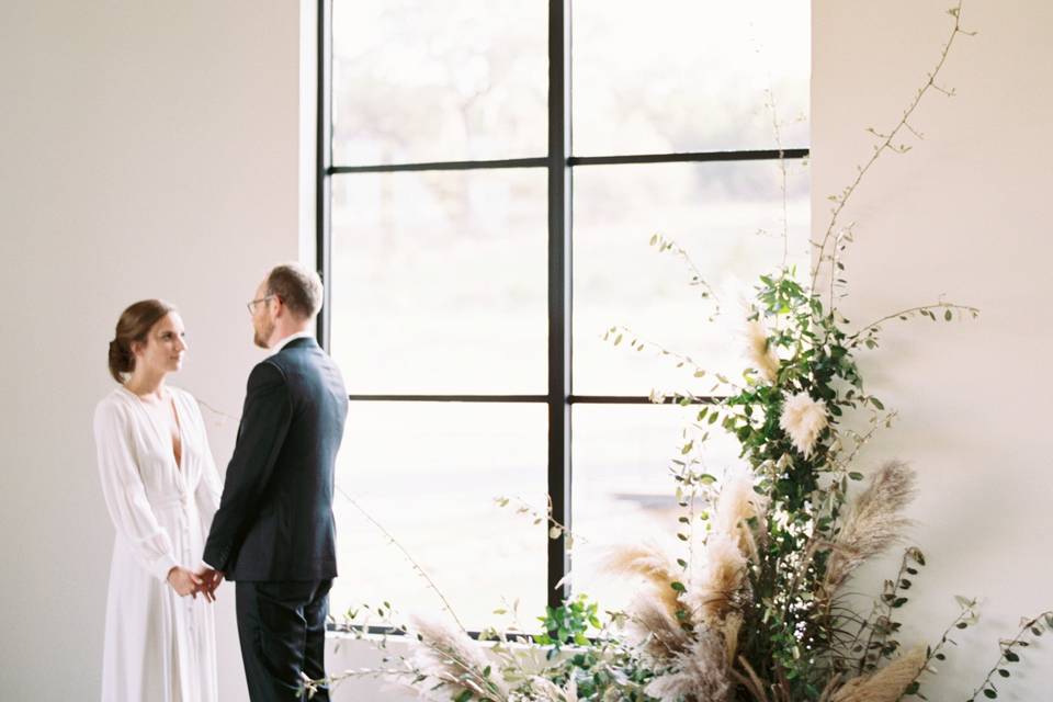 Newlyweds by the window