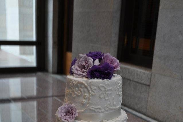 4-tier cake with violet flowers