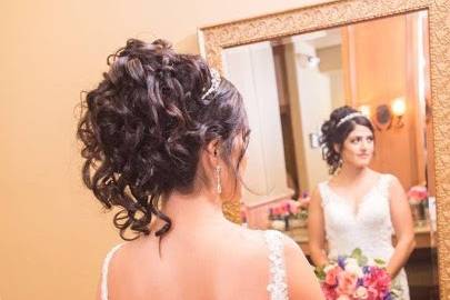 Bridal updo with loose curls