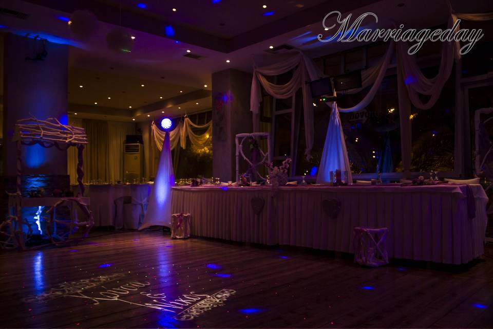 Marriageday gobo projector effect, with scrims on speaker and lighting stands and uplights