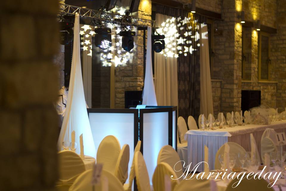 Marriageday weddings set up, with djbooth(facade), scrims for lighting stands, 4 intelligent moving heads and uplights