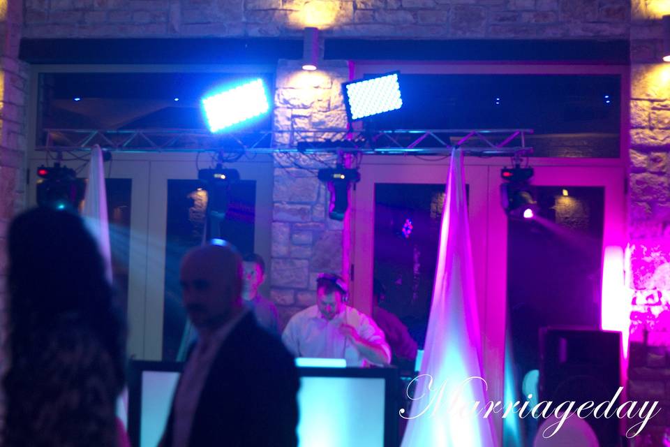 Marriageday weddings set up, with djbooth(facade), scrims for lighting stands, 4 intelligent moving heads and uplights