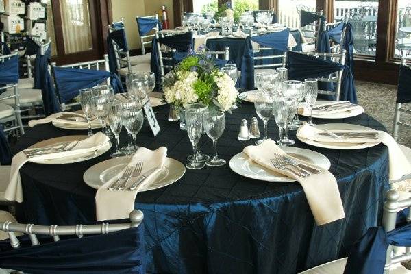 Navy overlays and chair sashes.  November reception