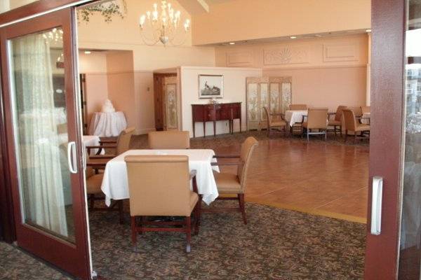 Dance floor in the Bay room with dining in the adjacent Cliff Room with a maximum of 150 guests.